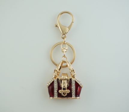 Porte-clé " Sac à main". Alpaca doré, Email, Zircon, Pierres